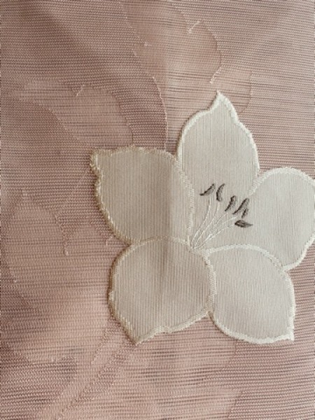 【未使用品】ピンクに白花　絽綴れ名古屋帯